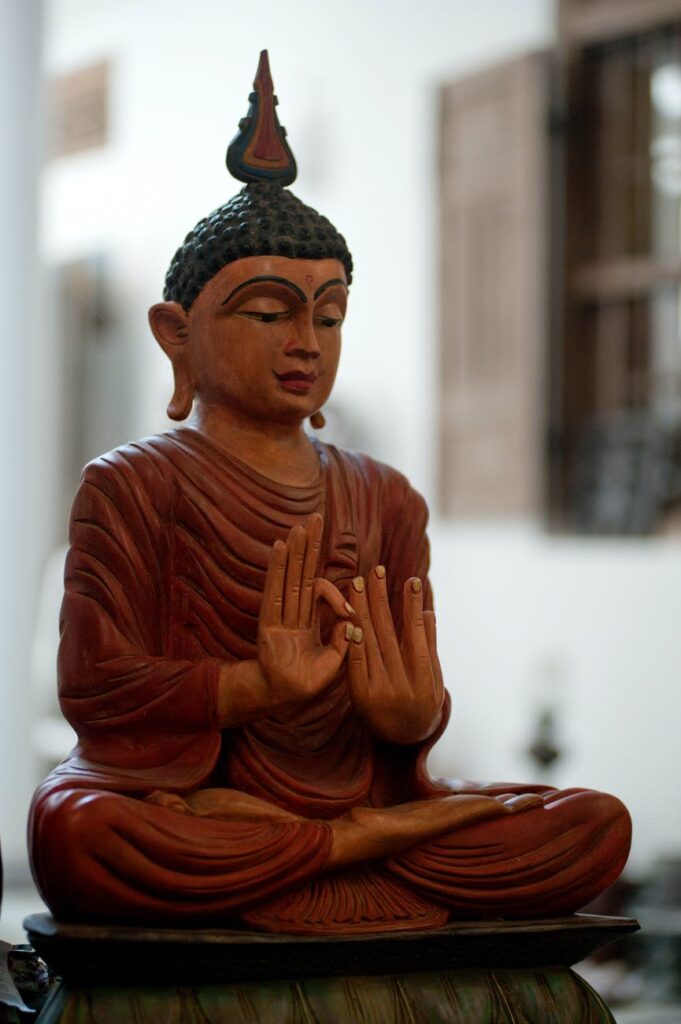 meditating buddha figurine