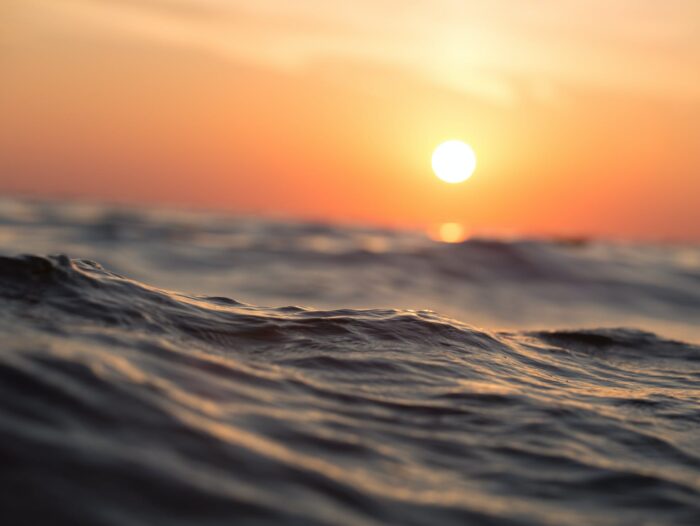 body of water during golden hour