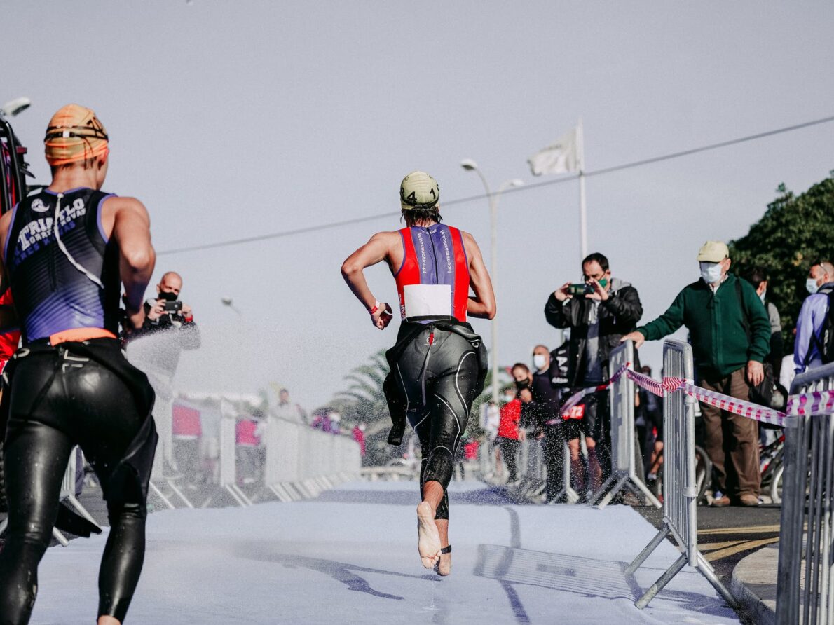 powerful athletes competing in triathlon race