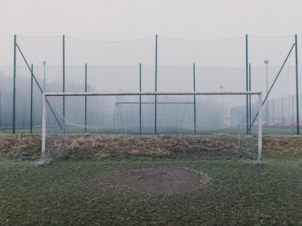 football goal net on the frosty grass