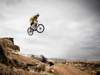 person riding bike making trek on thin air